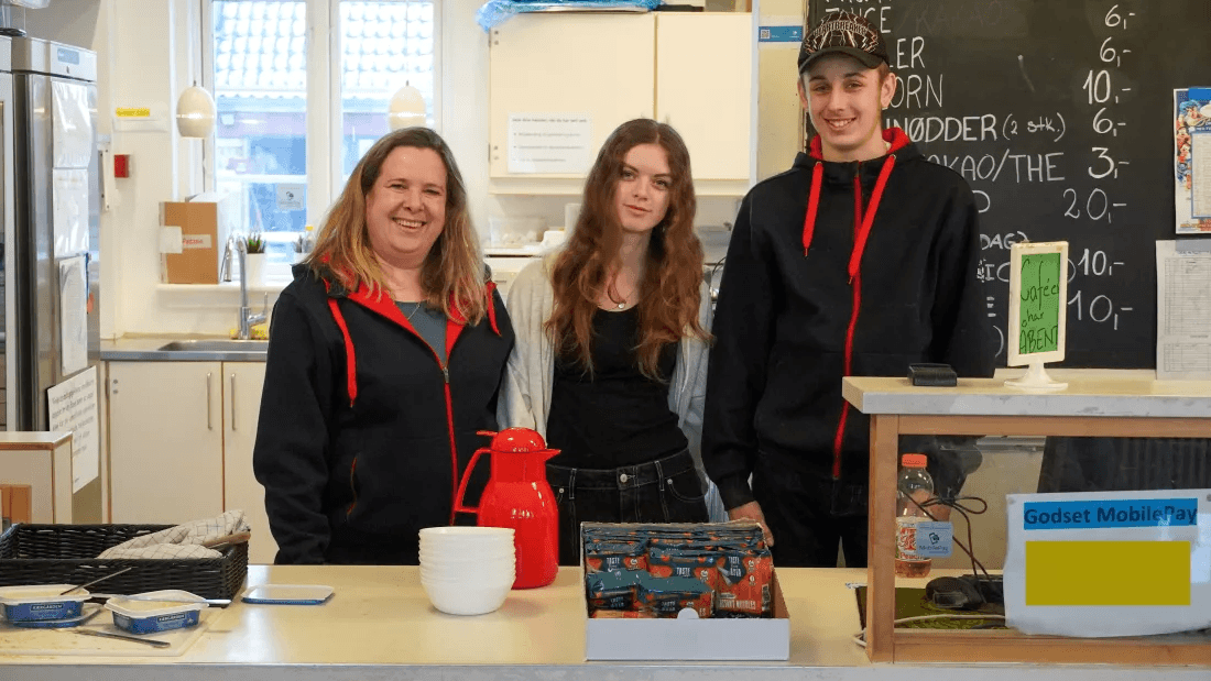 Michala Johansen, Head of Klub Godset, stands with staff members Jasmin and Mathias.