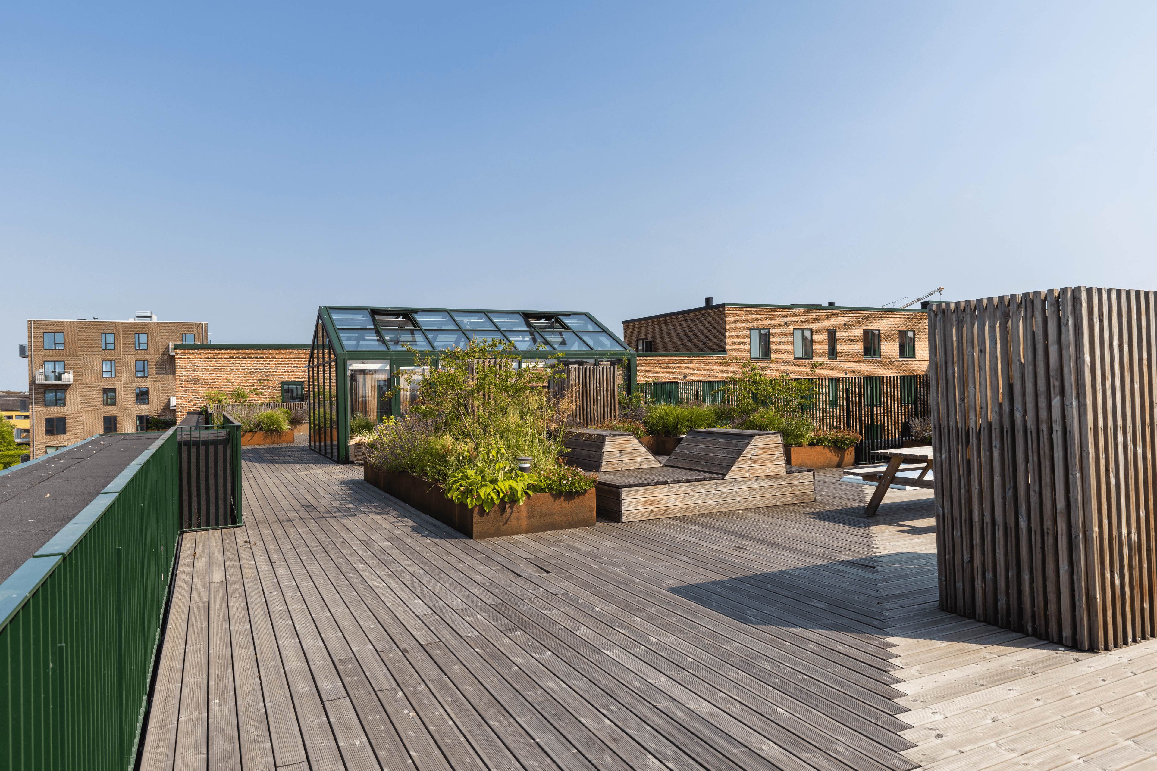Exterior view of the rooftop garden at Fyrkanten, showing the green roof terrace area